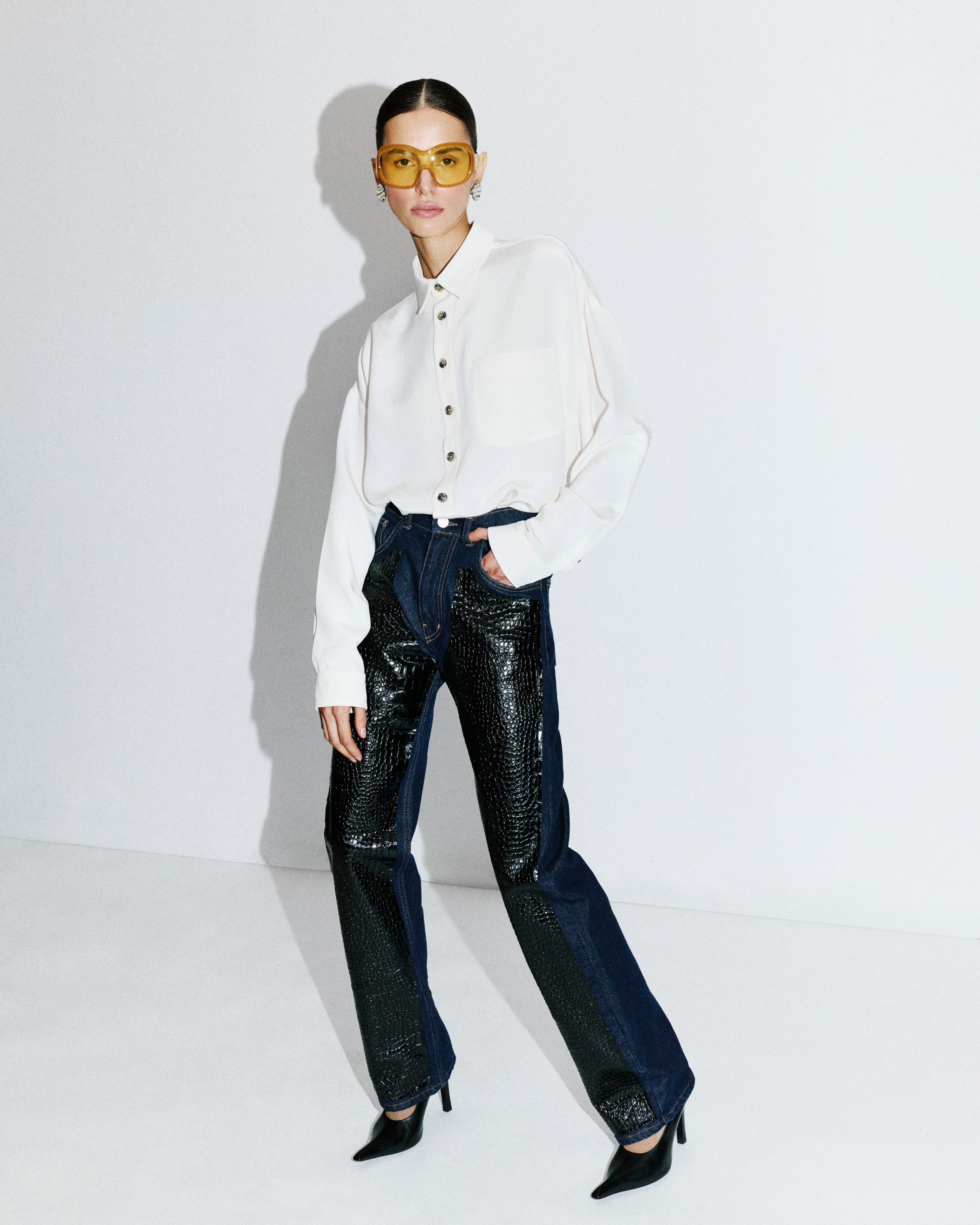 DENIM PANTS WITH LEATHER