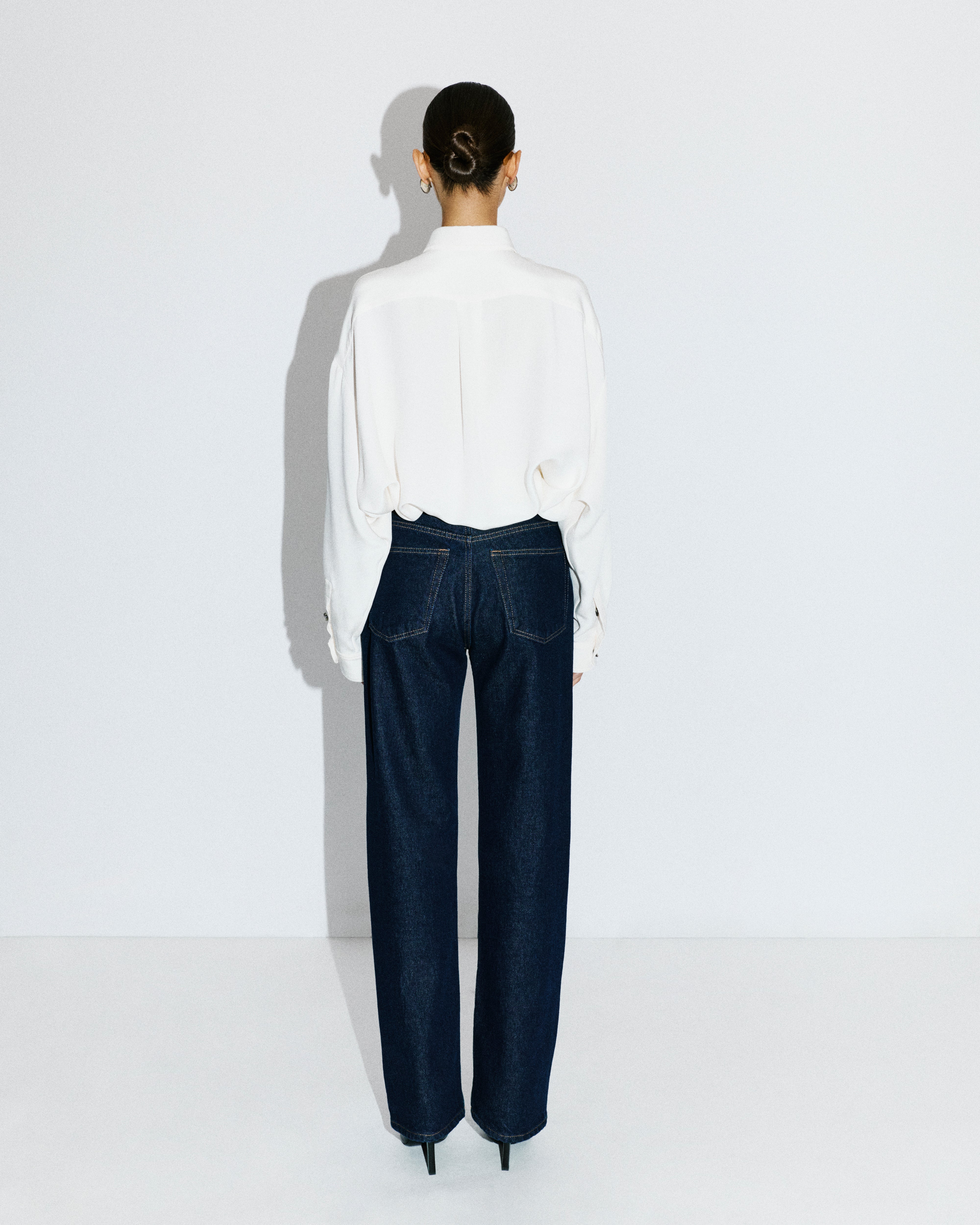 DENIM PANTS WITH LEATHER